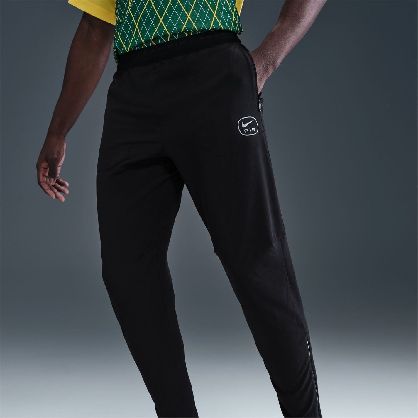 Nike Air Run Solid Patterned Track Pants