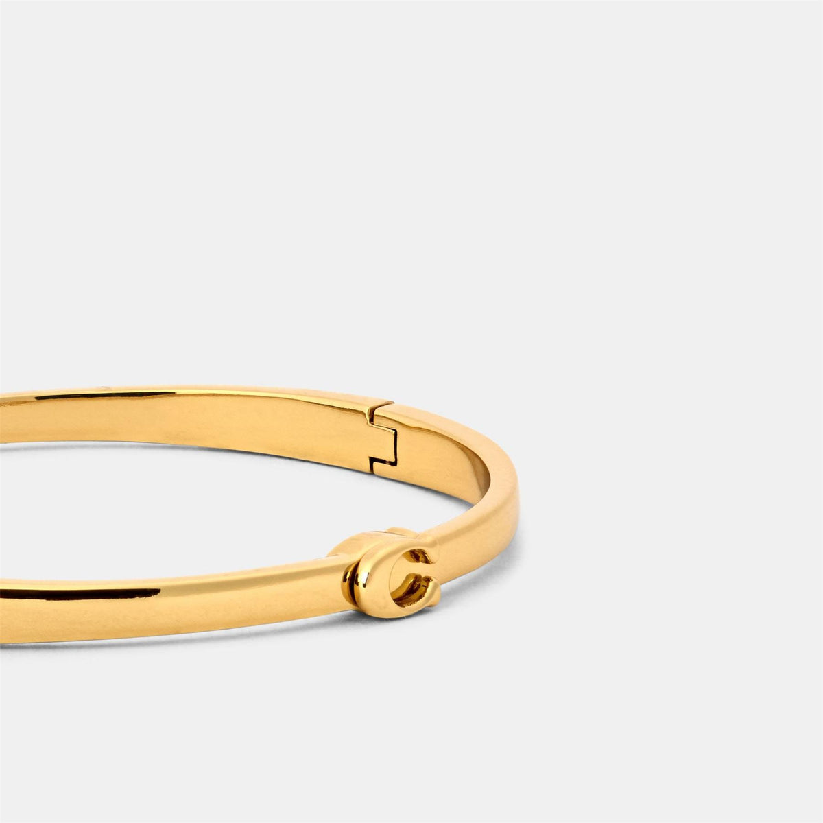 Coach Engraved Logo Bangle