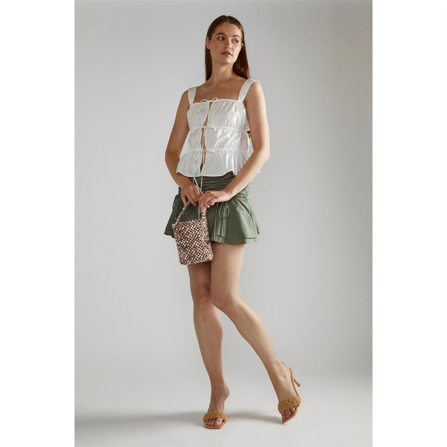 Narrated White Square Neck Sleeveless Top
