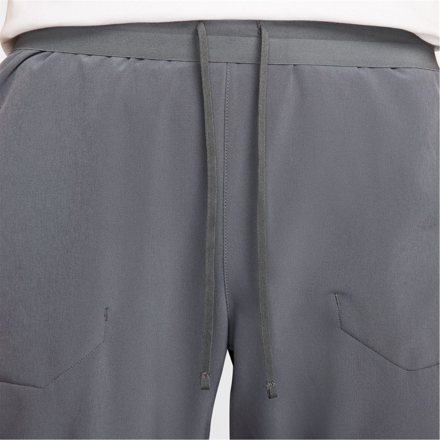 Nike Air Run Solid Patterned Track Pants