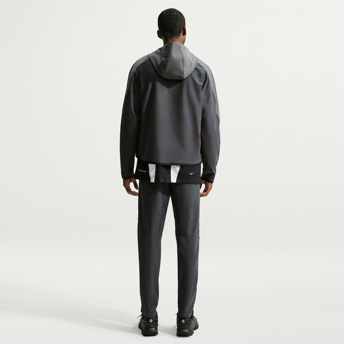 Nike Tech Solid Patterned Hooded Windbreaker with Woven Cuff