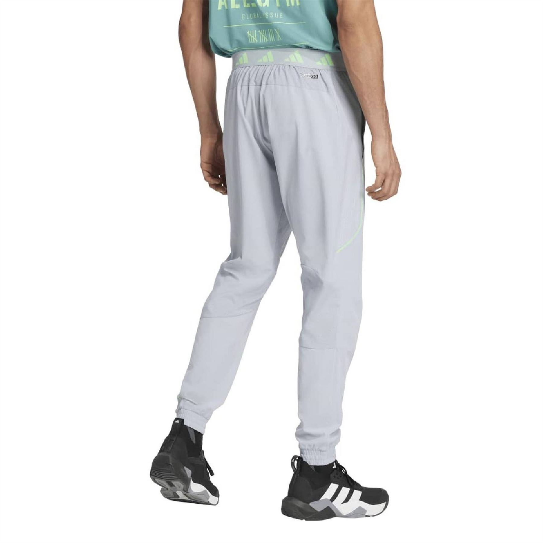 adidas Tech Solid Patterned Tapered Track Pants