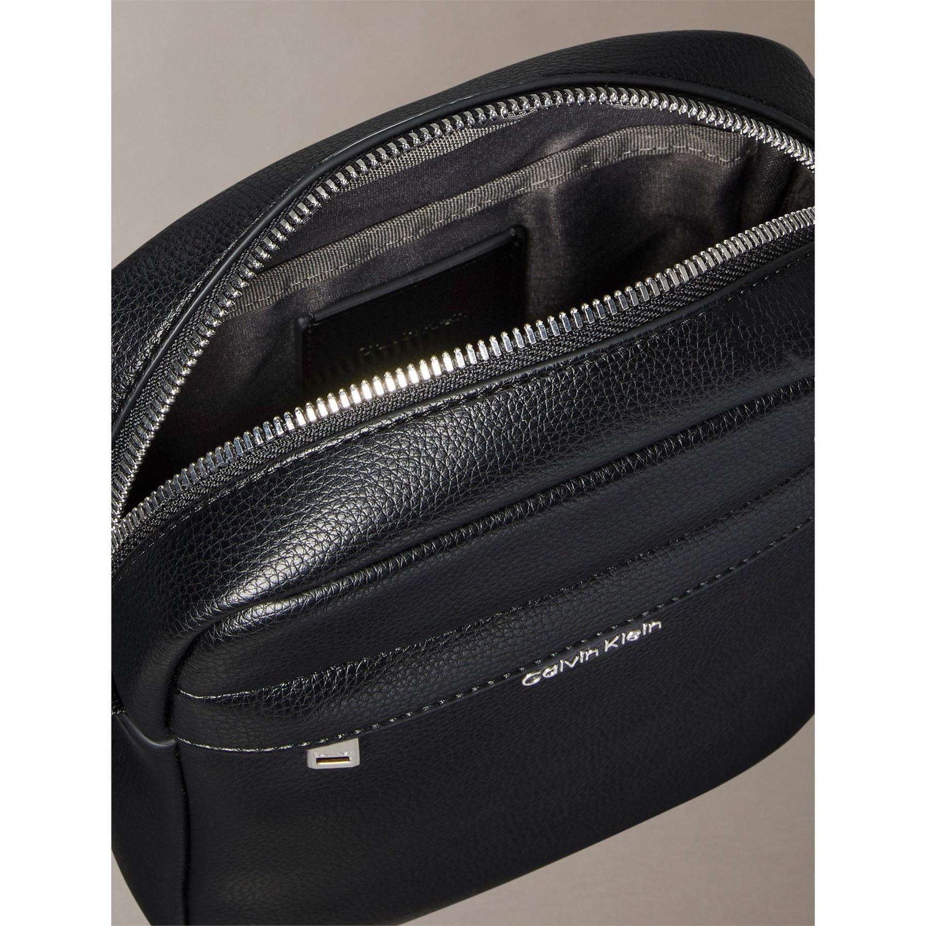 Calvin Klein Raised Reporter Cross Body Bag