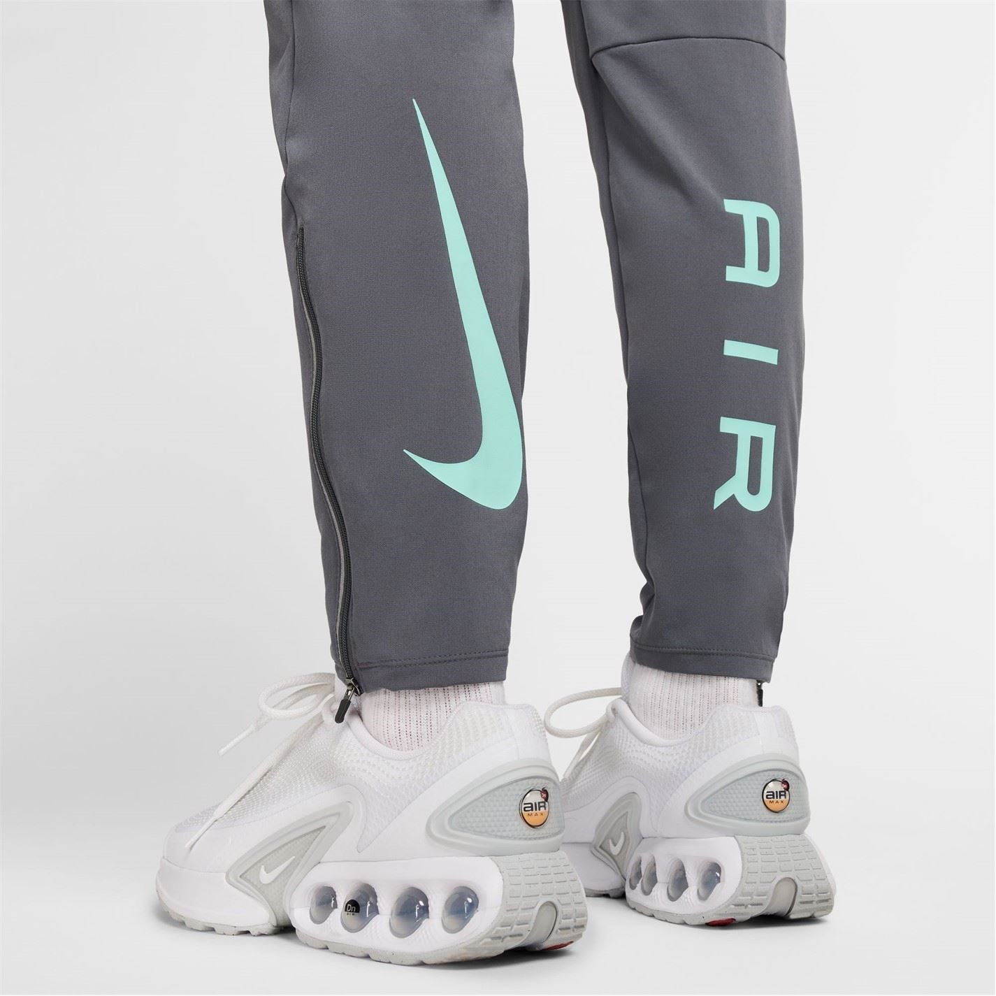 Nike Air Run Solid Patterned Track Pants